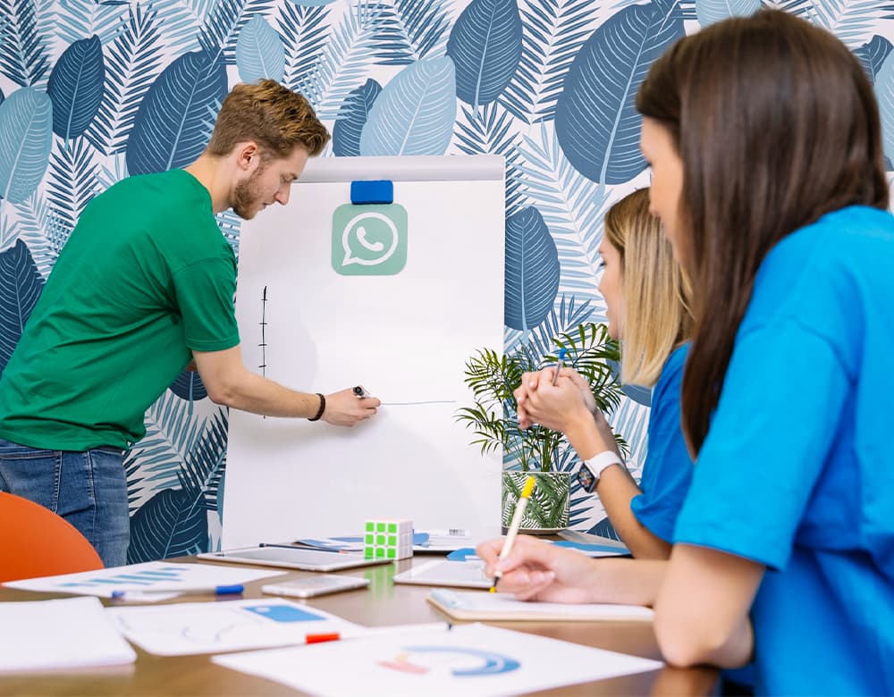 Sales team reviewing leads qualified automatically by a WhatsApp chatbot before handover